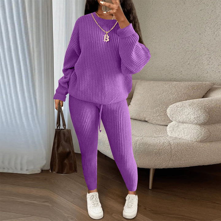 Woman in matching ribbed knit sweater and pants set
