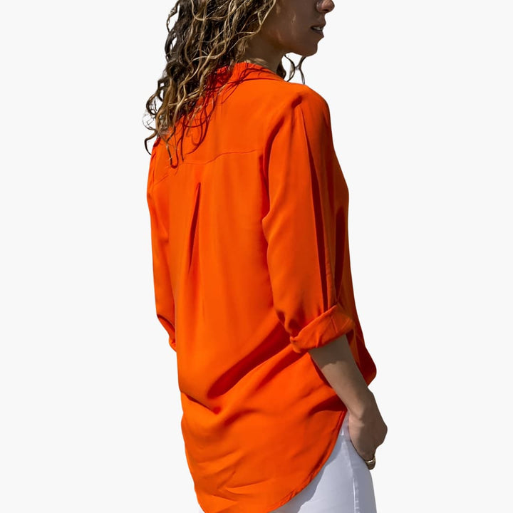 Women’s blouse with collar and button fastening