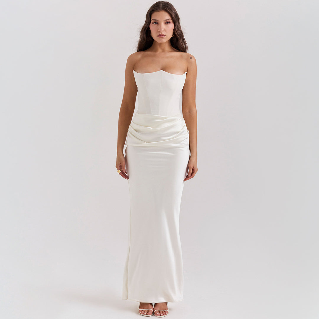Woman in a strapless satin maxi gown