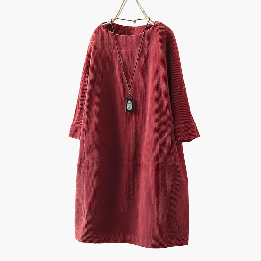 Women’s tunic dress with crew neckline and patch pockets