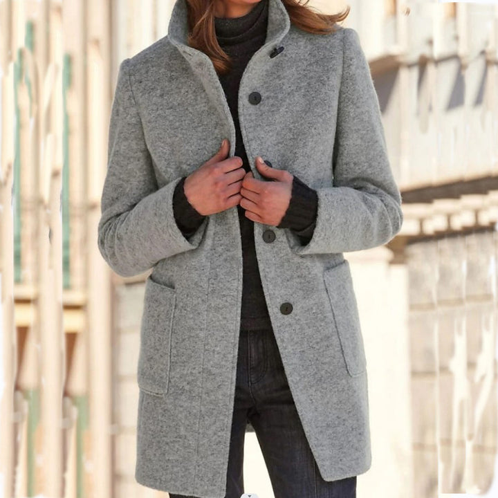 Stand collar button coat with pockets in a slim fit