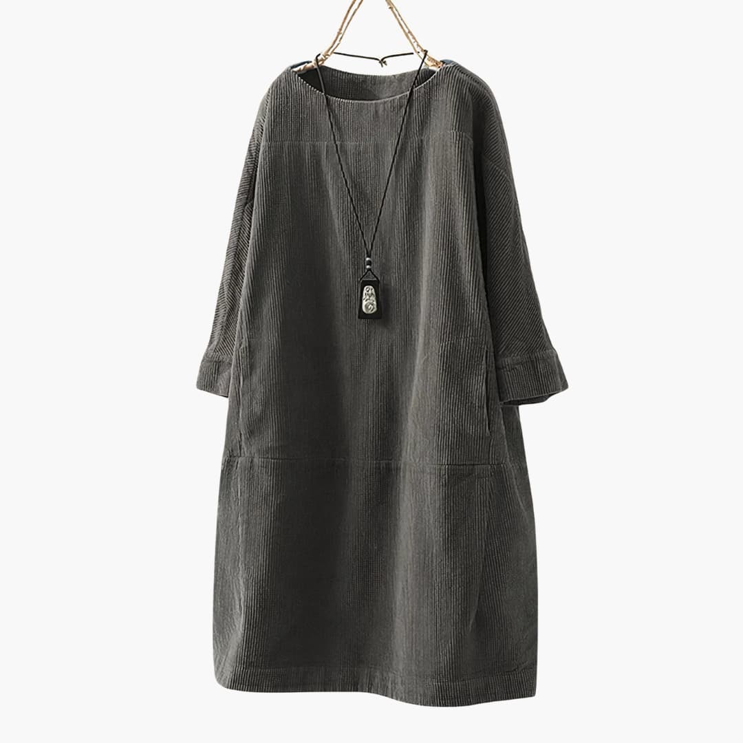 Women’s tunic dress with crew neckline and patch pockets