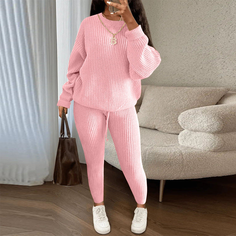 Woman in matching ribbed knit sweater and pants set