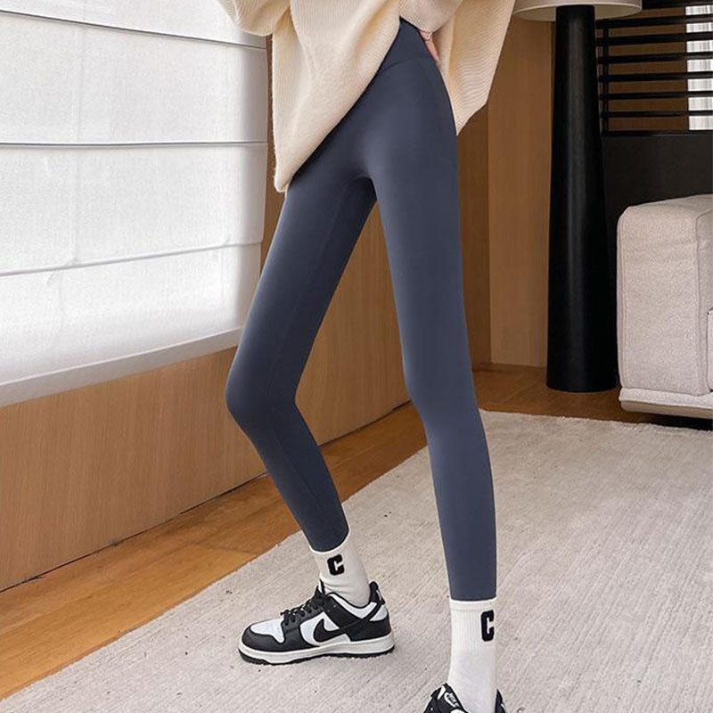 Woman in thick fleece lined leggings